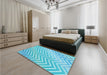 Patterned Bright Turquoise Blue Rug in a Bedroom, pat3985lblu