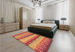 Patterned Orange Rug in a Bedroom, pat406org