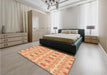 Patterned Orange Red Orange Rug in a Bedroom, pat410org