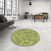 Round Patterned Green Rug in a Office, pat431brn