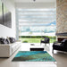 Square Patterned Turquoise Green Rug in a Living Room, pat440lblu