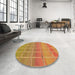 Round Patterned Yellow Rug in a Office, pat467org