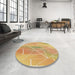 Round Patterned Orange Rug in a Office, pat482brn