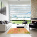 Square Patterned Yellow Orange Rug in a Living Room, pat482org