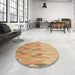 Round Patterned Yellow Orange Rug in a Office, pat483brn