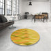 Round Patterned Gold Yellow Rug in a Office, pat483yw