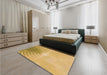 Patterned Saffron Yellow Rug in a Bedroom, pat494org