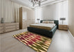 Patterned Saffron Red Rug in a Bedroom, pat511org