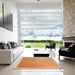 Square Patterned Neon Orange Rug in a Living Room, pat525org