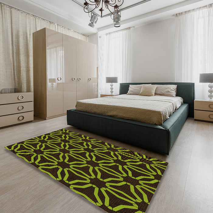 Patterned Dark Yellow Green Rug in a Bedroom, pat556org