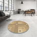 Round Patterned Yellow Orange Rug in a Office, pat575brn