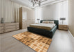 Patterned Yellow Orange Rug in a Bedroom, pat579org