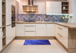 Patterned Blue Rug in a Kitchen, pat587pur