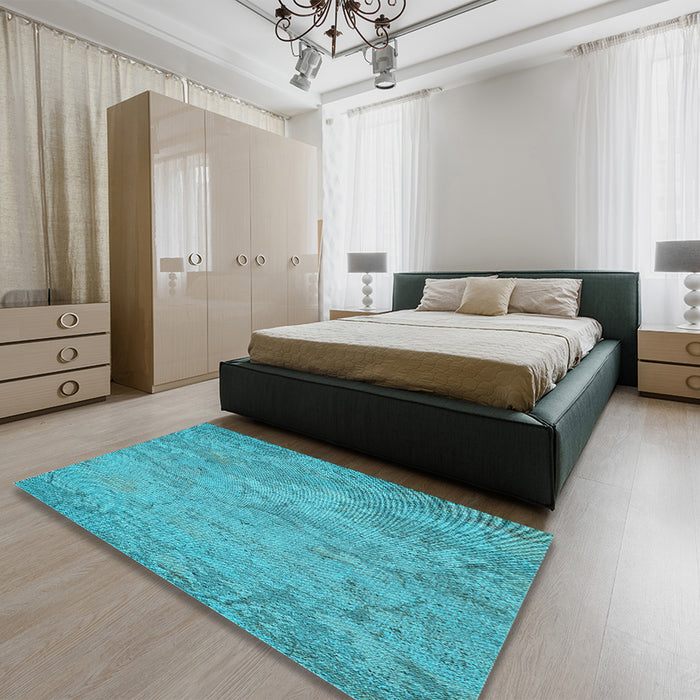 Patterned Bright Cyan Blue Rug in a Bedroom, pat621lblu