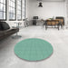 Round Patterned Medium Turquoise Green Rug in a Office, pat639lblu