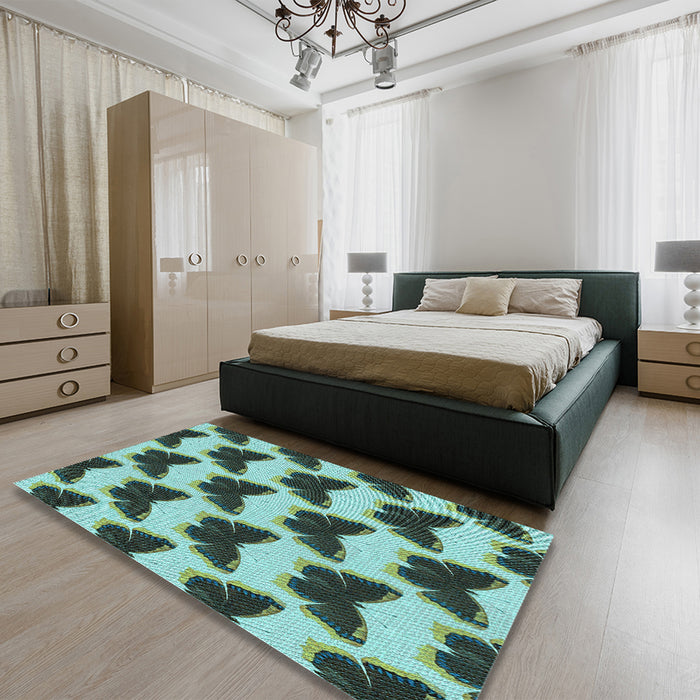 Patterned Medium Turquoise Green Rug in a Bedroom, pat654lblu
