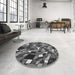 Round Patterned Dark Gray Black Rug in a Office, pat677gry