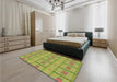 Patterned Dark Yellow Green Rug in a Bedroom, pat690brn