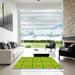 Square Patterned Green Rug in a Living Room, pat690yw