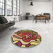 Round Patterned Saffron Red Rug in a Office, pat694brn