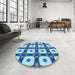 Round Patterned Blue Rug in a Office, pat695lblu