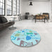 Round Patterned Blue Rug in a Office, pat696lblu