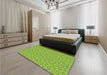 Patterned Yellow Green Rug in a Bedroom, pat698grn