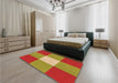 Patterned Orange Gold Rug in a Bedroom, pat723org