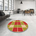 Round Patterned Red Rug in a Office, pat726org