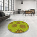 Round Patterned Dark Yellow Green Rug in a Office, pat751yw