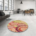 Round Patterned Red Rug in a Office, pat768org