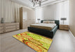 Patterned Yellow Rug in a Bedroom, pat768yw