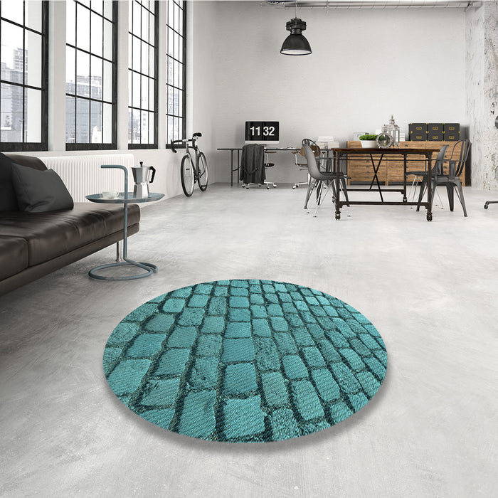 Round Patterned Turquoise Green Rug in a Office, pat780lblu