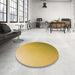 Round Patterned Saffron Yellow Rug in a Office, pat784org