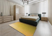 Patterned Saffron Yellow Rug in a Bedroom, pat784org