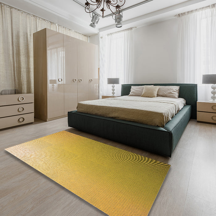 Patterned Saffron Yellow Rug in a Bedroom, pat784org