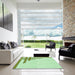 Square Patterned Green Rug in a Living Room, pat841grn