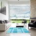 Square Patterned Bright Turquoise Blue Rug in a Living Room, pat851lblu