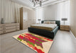 Patterned Yellow Orange Rug in a Bedroom, pat854org