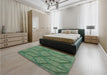 Patterned Dark Olive Green Rug in a Bedroom, pat869lblu