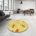 Round Patterned Bold Yellow Rug in a Office, pat879yw