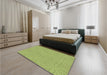 Patterned Green Rug in a Bedroom, pat885brn