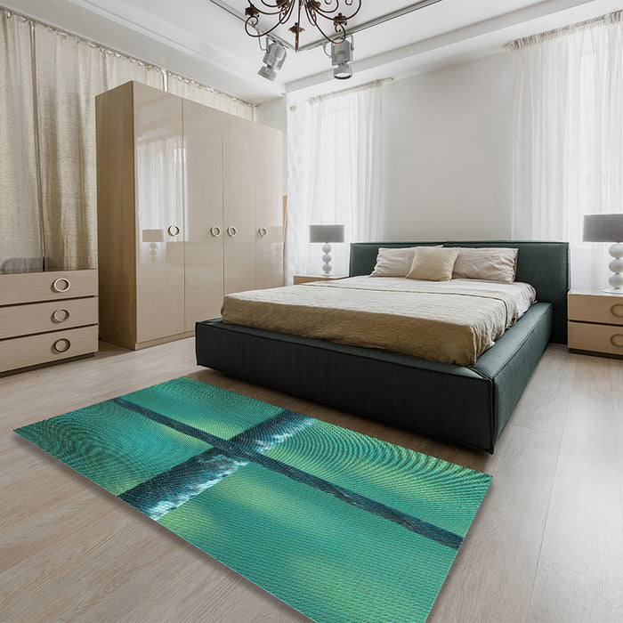 Patterned Medium Teal Green Rug in a Bedroom, pat892lblu