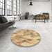 Round Patterned Yellow Rug in a Office, pat92brn