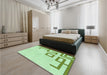 Patterned Green Rug in a Bedroom, pat939grn