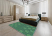 Patterned Medium Forest Green Rug in a Bedroom, pat982lblu
