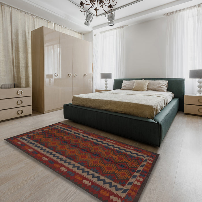 Traditional Saffron Red Southwestern Rug in a Bedroom, tr2638
