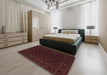 Traditional Burgundy Brown Southwestern Rug in a Bedroom, tr2667