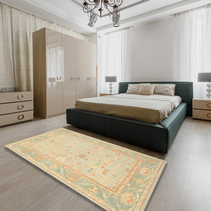 Traditional Brown Gold Oriental Rug in a Bedroom, tr540