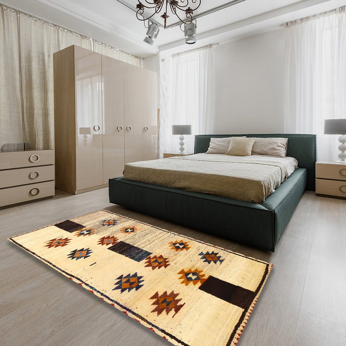 Traditional Gold Brown Southwestern Rug in a Bedroom, tr877